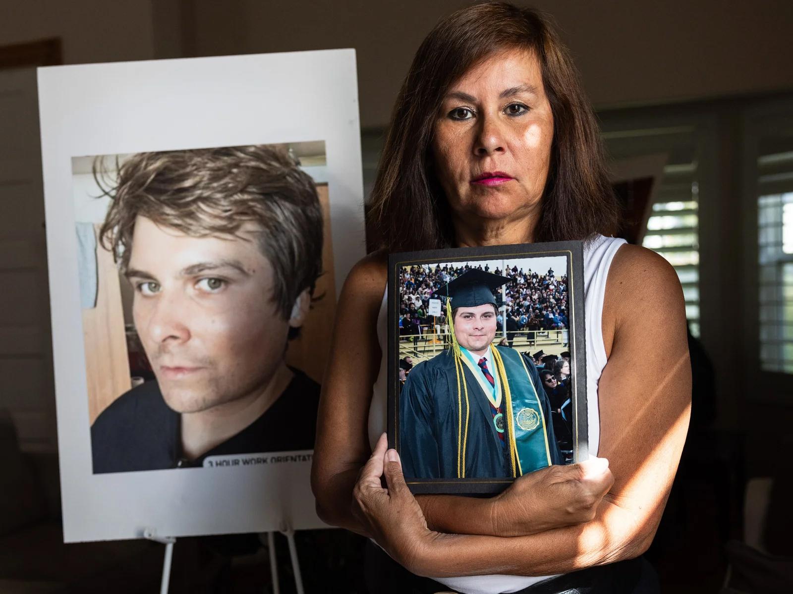 Bobby's mother tribute standing with his photo on an easel