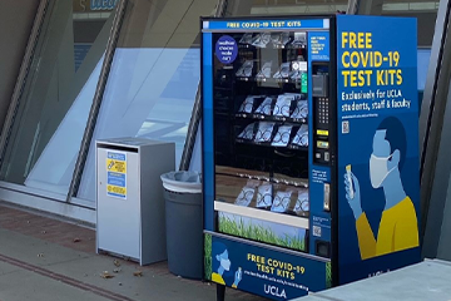 Vending machine with COVID tests in front of Pauley Pavilion