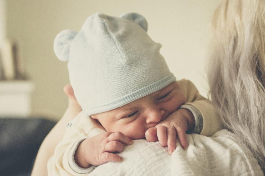 Baby being held